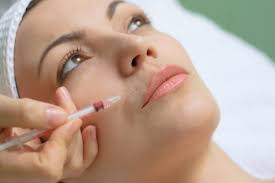 a lady receiving botox treatment