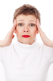 a lady with headache