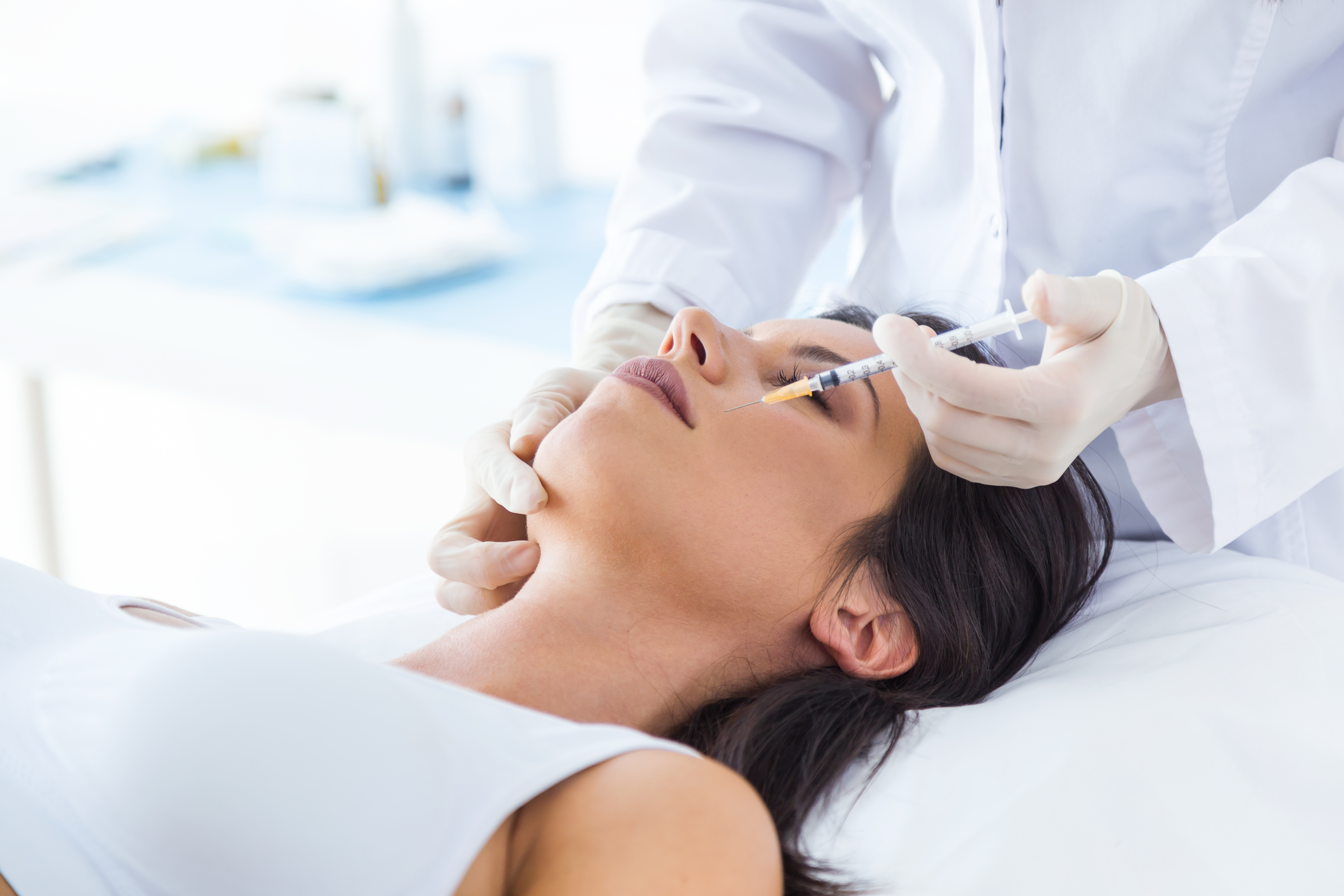woman getting botox cosmetic injection