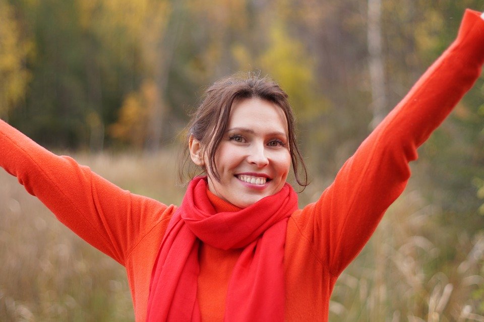 a lady wearing a sweater